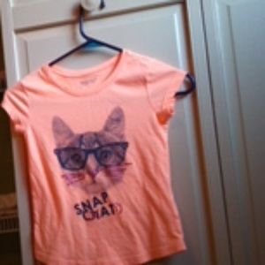 Selling a kids small 7/8 short sleeve short